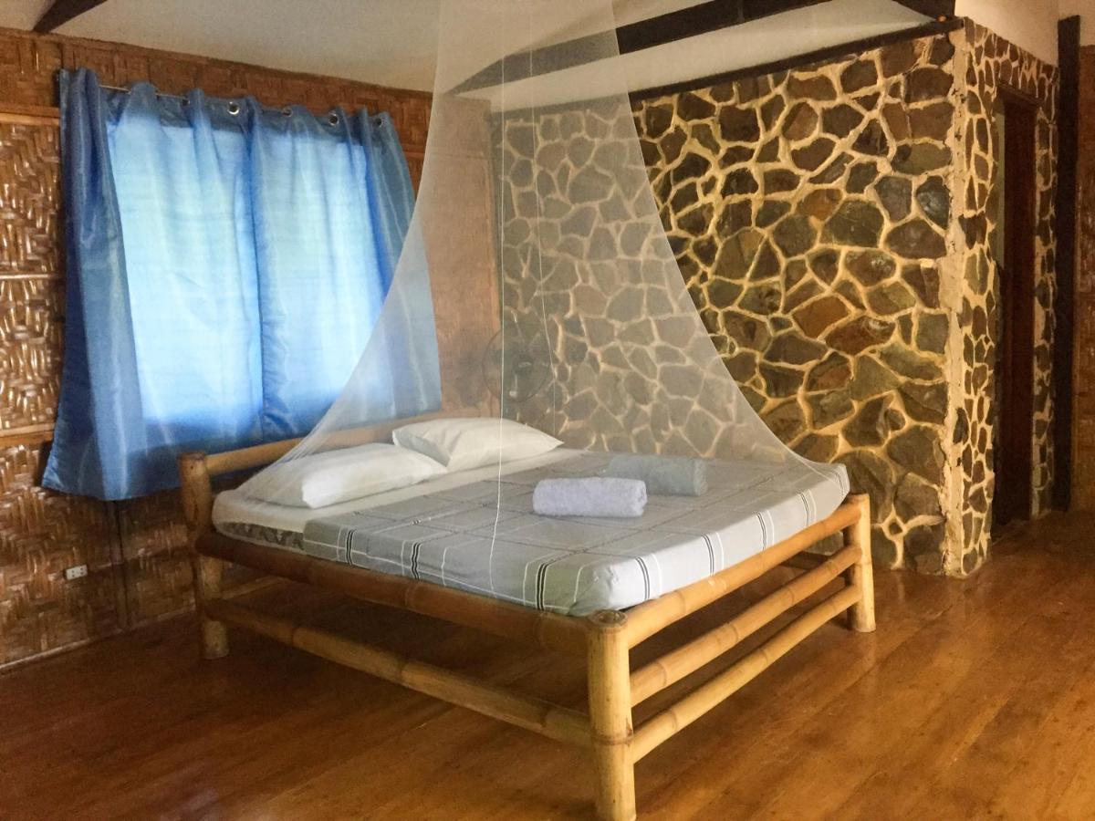 Beach House Resort And Dive Center Mambajao Esterno foto