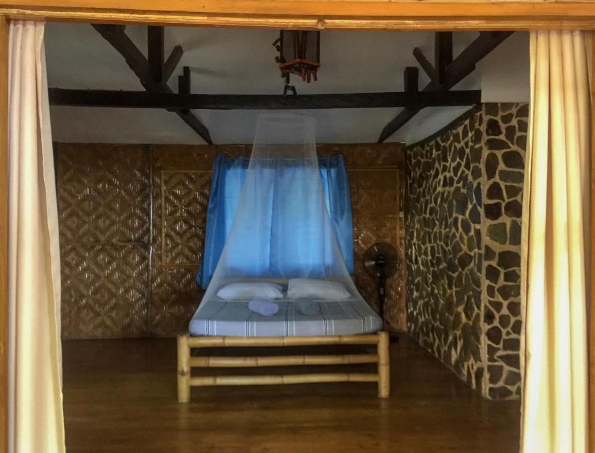 Beach House Resort And Dive Center Mambajao Esterno foto